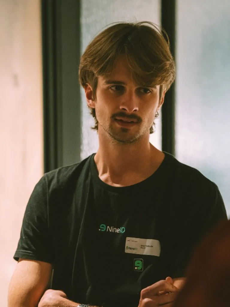9ID team member in conversation